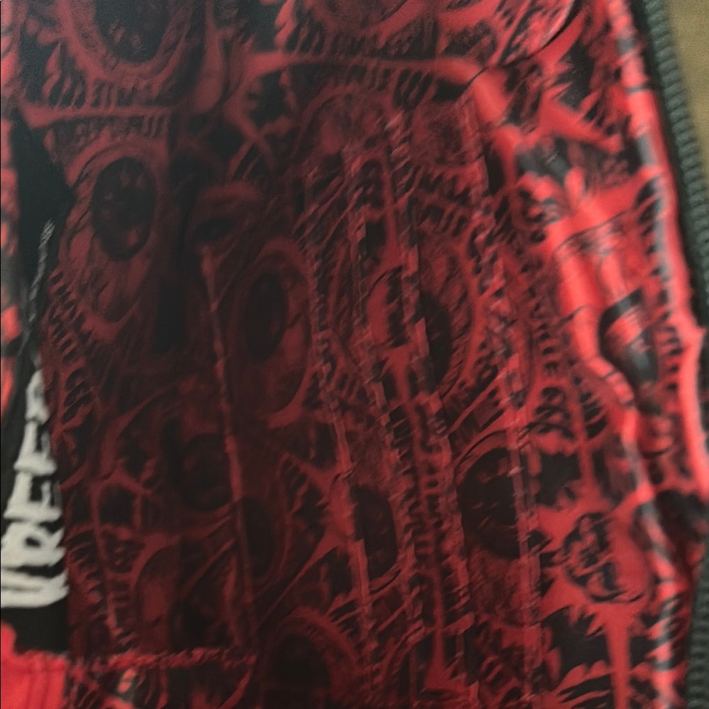 LAST CHANCE OFFER:
Kreepsville Cleaver Red and metallic Wristlet Clutch - Picture 3 of 3